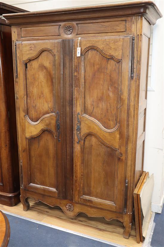 An early 19th century French oak and fruitwood armoire W.134cm